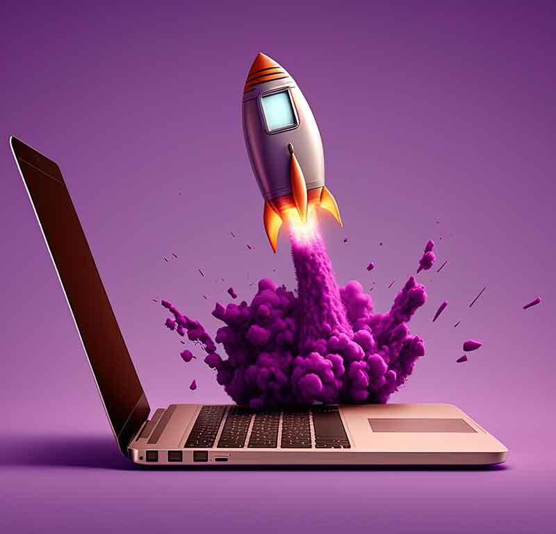 Web Design Manchester rocket launching from laptop